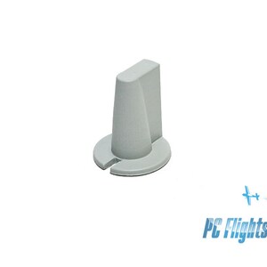 May include: A gray plastic knob with a round base and a raised, rectangular top. The knob has a small hole in the center of the base.