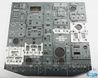 May include: A close-up of a gray metal panel with various switches, buttons, and gauges. The panel is labeled with text such as "Landing", "Engine Start", "Logo Position", "Retract", "CONT", "Sand Alt", and "PC Flights".