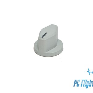 May include: A gray plastic knob with a black arrow pointing down. The knob is designed for use with a control panel or other device.