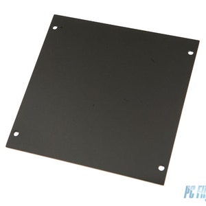 May include: A black metal blank plate with four holes around the edges. The plate is flat and smooth.