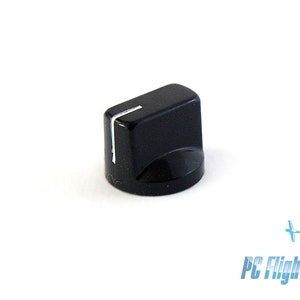 May include: Black knob with a white line on the top. The knob is a replacement part for electronic equipment.