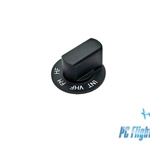 May include: Black knob with a round dial labeled "INT", "VHF", "FM", and "HF".