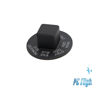 May include: Black aircraft electrical switch with a square button and a round base. The base is labeled with the text "STBY GEN", "GEN", "MAIN GEN", and "BAT".