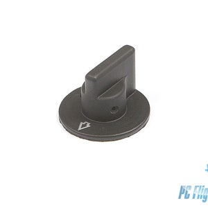 May include: A black plastic knob with a round base and a flat top. The knob has a small arrow pointing upwards.
