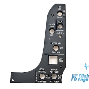 May include: Black metal panel with various switches and labels, including "RF NORM", "QUIET", "SILENT", "ECM", "LASER ARM", "ALT REL", "MASTER ARM", "SIMULATE", "ADV MODE", "ROLL HDG SEL", "PITCH ALT HOLD", "ATT HOLD", "A/P OFF", "STRG SEL", "ATT HOLD", and "MISC".
