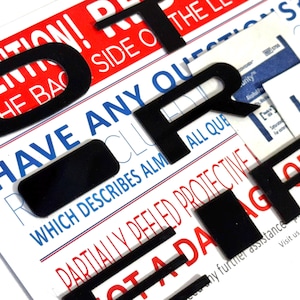 May include: Black vinyl letters spelling out "HAVE ANY QUESTIONS?" on a white background with blue and red text. The text reads "Which describes almost all questions? Partially peeled protective film not a damage or defect."