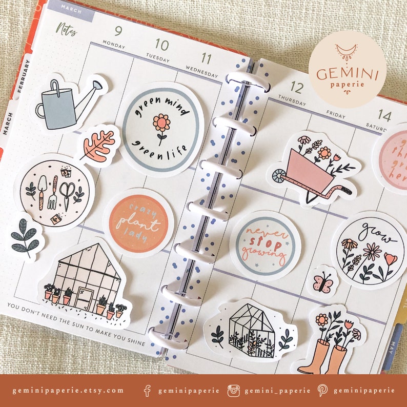 May include: A collection of colorful stickers featuring gardening and plant-themed illustrations. The stickers include phrases like "green mind green life", "crazy plant lady", "never stop growing", and "grow". The stickers are arranged on a planner page with dates and days of the week.