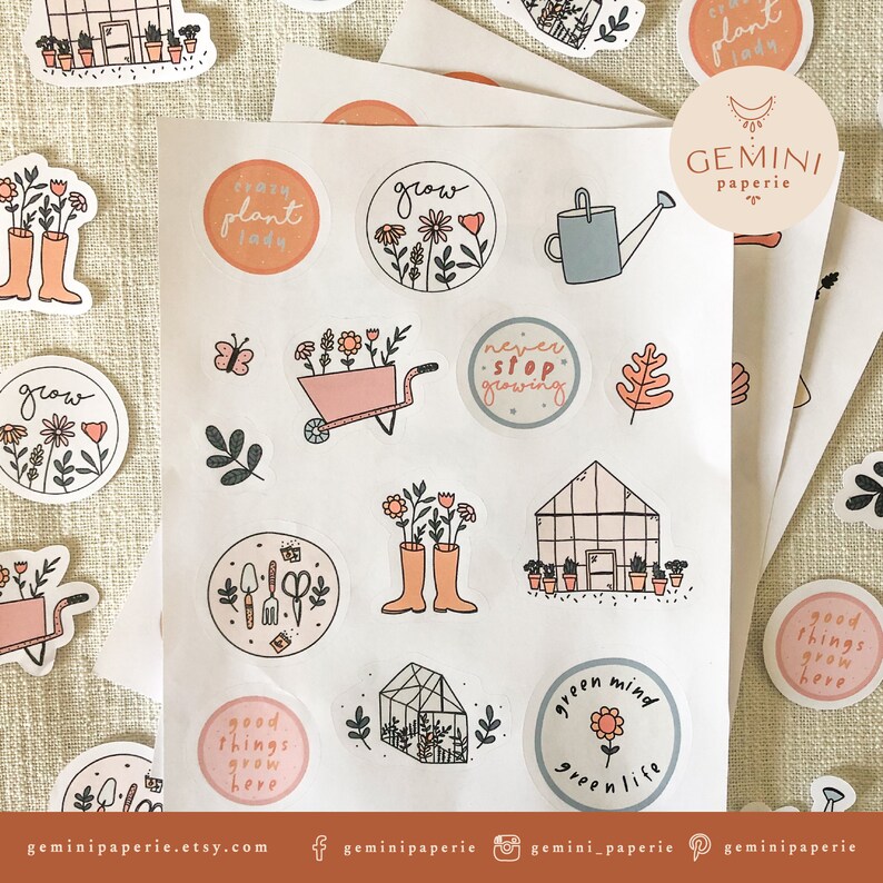 May include: A sheet of stickers with a gardening theme. The stickers are round and feature illustrations of plants, flowers, gardening tools, and text such as "grow", "crazy plant lady", "never stop growing", and "good things grow here".