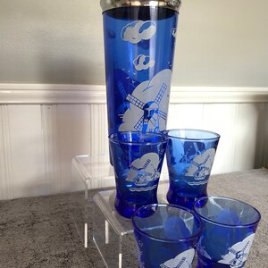 A Set of Four Decorative Cobalt Blue Water Glasses
