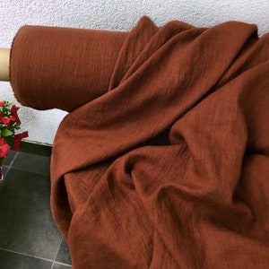 Rust/Terracotta 100% Linen fabric 205gsm, 145cm/58inches wide. Medium weight,densely woven,prewashed,softened,for various sewn products