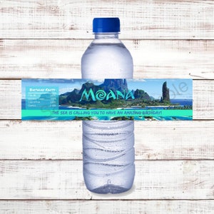 May include: Water bottle label with a blue background and a picture of a tropical island with the text "MOANA" in a green circle. The text "THE SEA IS CALLING YOU TO HAVE AN AMAZING BIRTHDAY!" is below the picture. The label also includes a list of birthday facts with the text "BIRTHDAY FACTS" at the top.