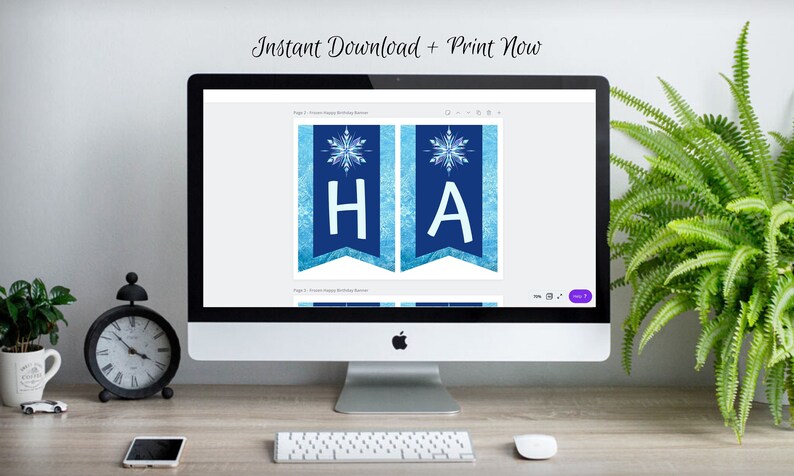 May include: A computer screen displaying a printable Frozen-themed birthday banner with blue and white snowflake designs. The banner says "Happy Birthday".