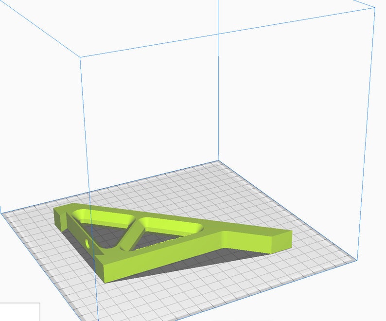 K&ouml;nnte beinhalten: Eine gr&uuml;ne, 3D-gedruckte Halterung aus Kunststoff in Dreiecksform mit einem Loch in der Mitte.