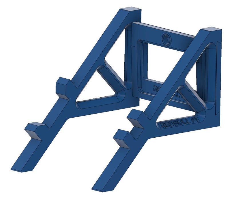 May include: Two blue, geometric support structures. Each structure has a triangular design with angled legs and a rectangular center. The text "REDBULL P1" is visible on one of the structures.