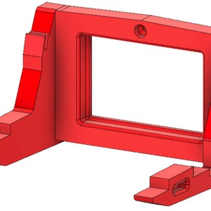 May include: A red plastic wall mount with a rectangular opening in the center. The mount has a small hole at the top for hanging.