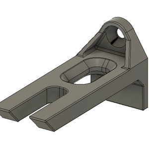 May include: A gray metal bracket with two slots and a round hole. The bracket is designed to be mounted to a wall or other surface.
