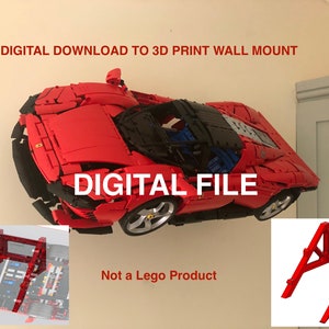 May include: Digital download file for a 3D printed wall mount for a red Lego Ferrari. The file is not a Lego product. The image shows the car mounted on the wall and a close-up of the wall mount.