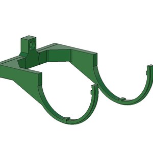 May include: A green, 3D-printed bracket with a rectangular top section and two curved, semi-circular arms. The top section has a hole for mounting. The arms have small notches at the ends.