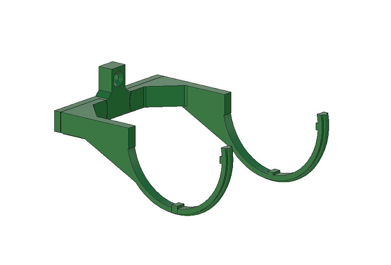 May include: A green, 3D-printed bracket with a rectangular top section and two curved, semi-circular arms. The top section has a hole for mounting. The arms have small notches at the ends.