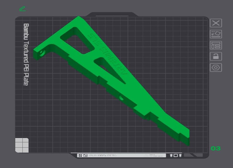 May include: A green plastic 3D printed part with the text "STEFAN" printed on it. The part is on a gray grid background.