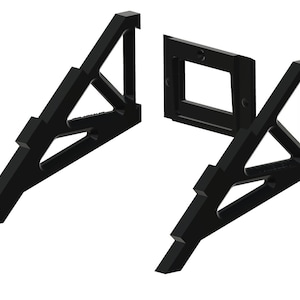 May include: Black plastic stand with two triangular supports and a rectangular centre piece. The stand is designed to hold a phone or tablet.