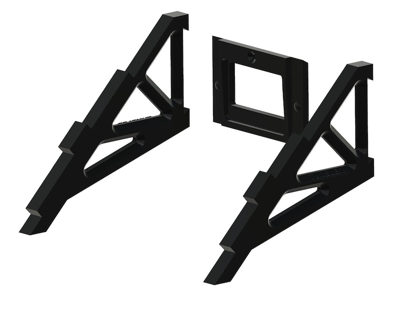 May include: Black plastic stand with two triangular supports and a rectangular centre piece. The stand is designed to hold a phone or tablet.
