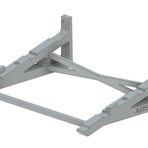 May include: A gray metal stand with a triangular design and the text "ARTEMIS SLS" printed on the side. The stand is designed to hold a laptop or other device.