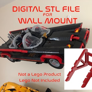 May include: A digital STL file for a wall mount for a black and red Lego Batmobile. The image shows a red and black Lego Batmobile and a red wall mount. The text "DIGITAL STL FILE FOR WALL MOUNT" is at the top of the image. The text "Not a Lego Product Lego Not Included" is at the bottom of the image.