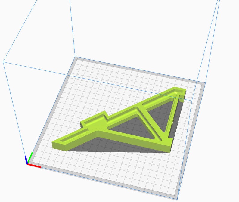 May include: A lime green 3D printed model of a geometric shape with a triangular base and multiple intersecting planes. The model is sitting on a gray grid surface.