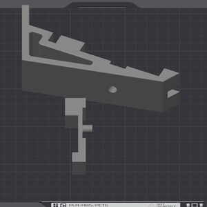 Puede incluir: Una pieza gris impresa en 3D con una superficie texturizada. La pieza est&aacute; dise&ntilde;ada para ser utilizada con una impresora 3D. El texto "Bambu Textured PEI Plate" es visible en el lado izquierdo de la imagen.