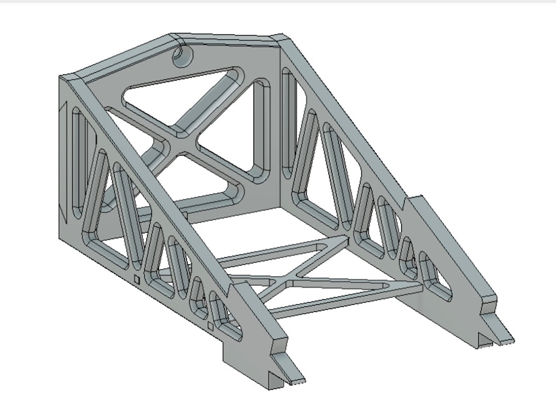 May include: A gray metal stand with a triangular shape and a lattice design. The stand has a flat top and a base with two angled legs.