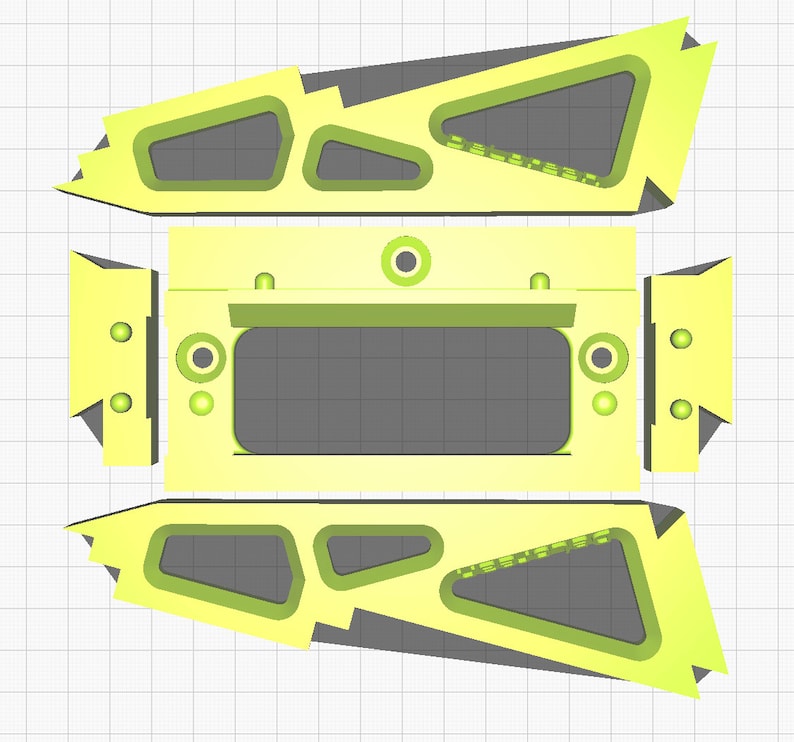 K&ouml;nnte beinhalten: Ein geometrisches Design in Gelb und Grau mit drei Teilen. Die oberen und unteren Teile haben ein Ausschnittdesign. Das mittlere Teil hat eine rechteckige &Ouml;ffnung.
