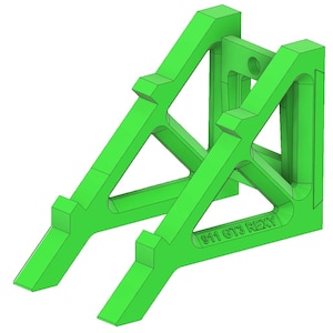 May include: A bright green, 3D-printed support structure. The design features angled supports and a central connecting piece. The text "911 GT3 REXY" is printed on the base. The structure is designed to hold an object.