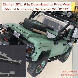 Puede incluir: Un soporte de pared impreso en 3D para exhibir un modelo LEGO Defender 90. El soporte est&aacute; hecho de pl&aacute;stico negro y tiene un dise&ntilde;o simple. El soporte se muestra frente a un modelo LEGO Defender 90 verde. El texto "Digital (STL) File Download to Print Wall Mount to display Defender 90 (10317)" es visible en la imagen. El texto "DEFENDER" es visible en el modelo LEGO. El texto "LEGO not Included Not a LEGO Product" es visible en la imagen.