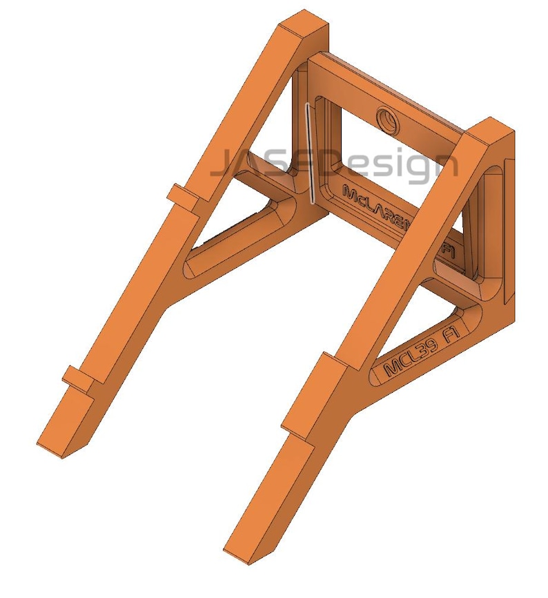 May include: An orange-colored, angled bracket with the text "JAS Design" and "McLaren" visible. The bracket has a rectangular opening and is designed with structural supports. The text "MCL39 A" is also visible.