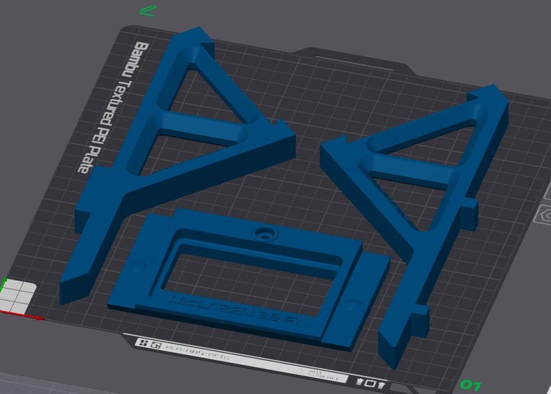 May include: A 3D-rendered image of blue plastic components, including two triangular supports and a rectangular frame. The components are arranged on a dark gray surface with a grid pattern. Text on the surface reads "Bambu Textured PEI Plate".