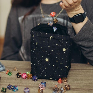 Dice bag standing upright with square bottom