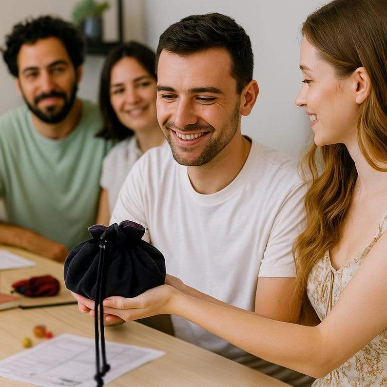 DnD players using galaxy dice bag during tabletop RPG session