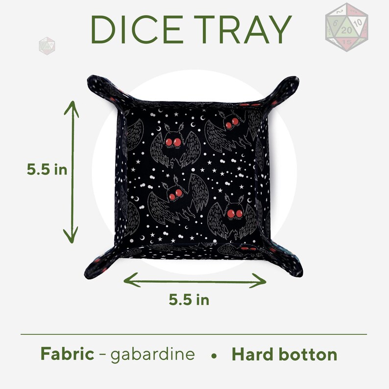 May include: Black dice tray with a bat and star pattern. The tray is 5.5 inches wide and 5.5 inches long. It is made of gabardine fabric and has a hard bottom.