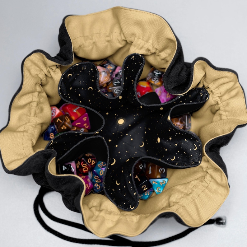 Galaxy velvet dice bag with star constellation print and drawstring closure