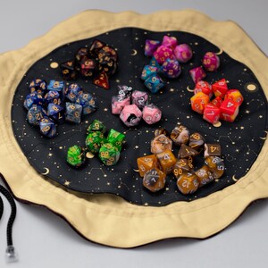 Dice bag opened flat showing inner lining and dice storage space