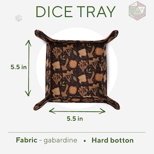 May include: A square dice tray with a dark brown background featuring a repeating pattern of tan and orange mushrooms and green leaves. The tray measures 5.5 inches by 5.5 inches. It is constructed with a gabardine fabric surface and a hard bottom.