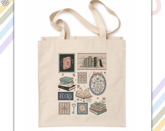 May include: A natural-colored canvas tote bag featuring a multi-colored graphic print of stacked books, a floral oval frame, bows, a key, and the word BOOKS. The design includes various rectangular frames with pastel-colored patterns and small strawberry illustrations.