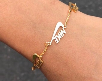 nike bracelet gold