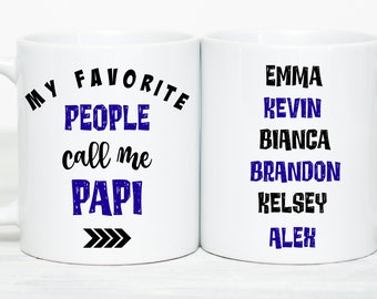 May include: White ceramic coffee mug with black text that reads "My favorite people call me Papi" with three arrows pointing to the right. The other side of the mug has black text that reads "Emma, Kevin, Bianca, Brandon, Kelsey, Alex".