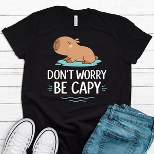 Don&#39;t Worry Be Capy, Funny Capybara Shirt, Cute Animal Pun Tee, Capybara Lover Gift, Trendy Graphic Top, Cute Capybara Shirt LP0060