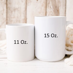 May include: Two white ceramic mugs, one is 11 ounces and the other is 15 ounces.