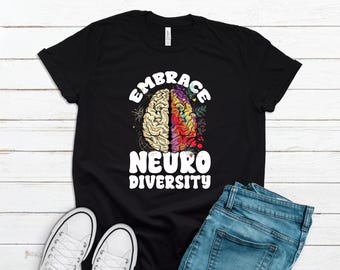 May include: Black t-shirt with a white graphic of a brain with the text "Embrace Neuro Diversity".