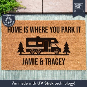 a door mat that says home is where you park it
