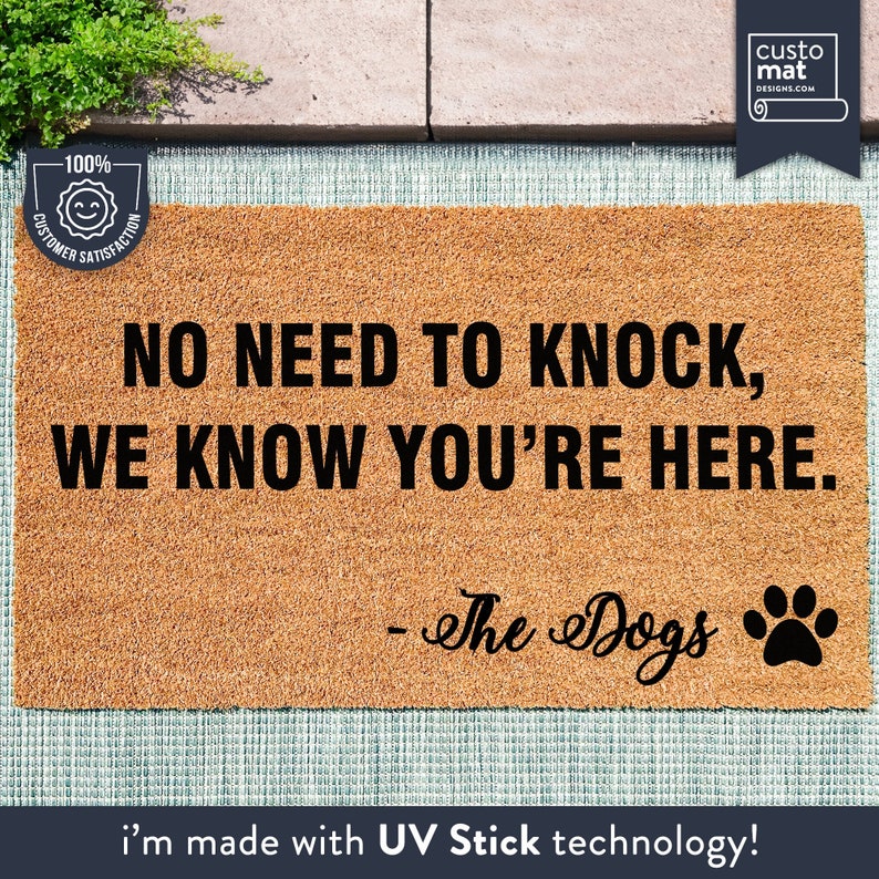a door mat with a dog saying on it